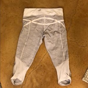 Gray and white striped lululemon capris size 4